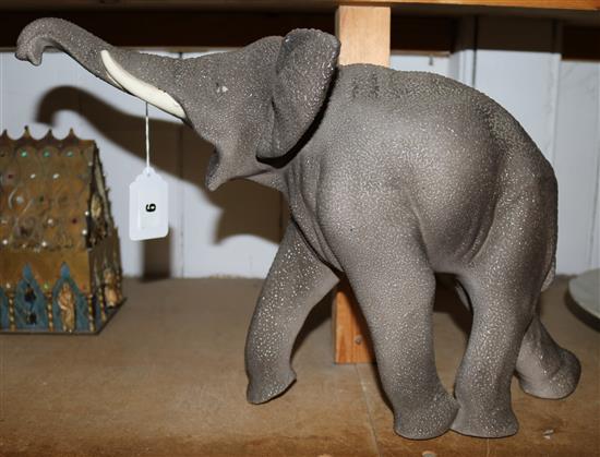 Sevres Vinsare model of a trumpeting elephant(-)
